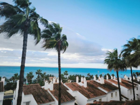 Terraced house near the beach in urbanization with swimming pools, mini golf, tennis and private park for kids in Mijas Costa